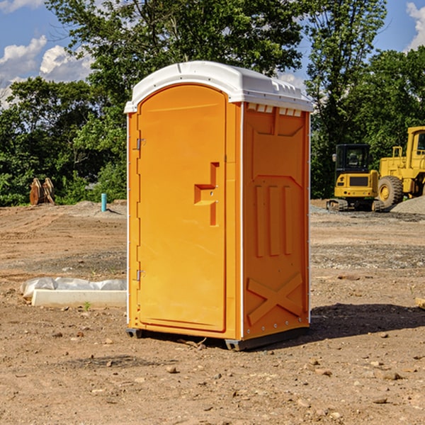 how often are the portable restrooms cleaned and serviced during a rental period in Braddyville IA